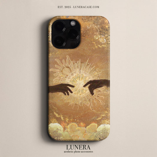 LUNERA 'Creation of Light' Case – Sanatsal Eller ve Işık Temalı Altın Tonlu Kılıf